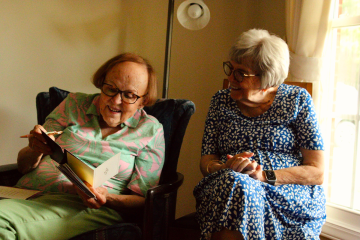 meredith pritchard two older ladies reading a birthday card